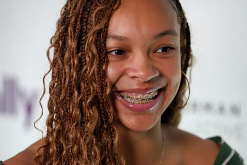 Close-up portrait of a smiling Hannah Hidalgo